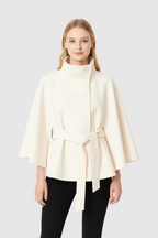 Wool blend coat in blue with high collar and belt, front view