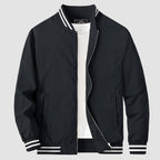 Lightweight bomber jacket windbreaker in black with rib-knit collar and full metal zip.