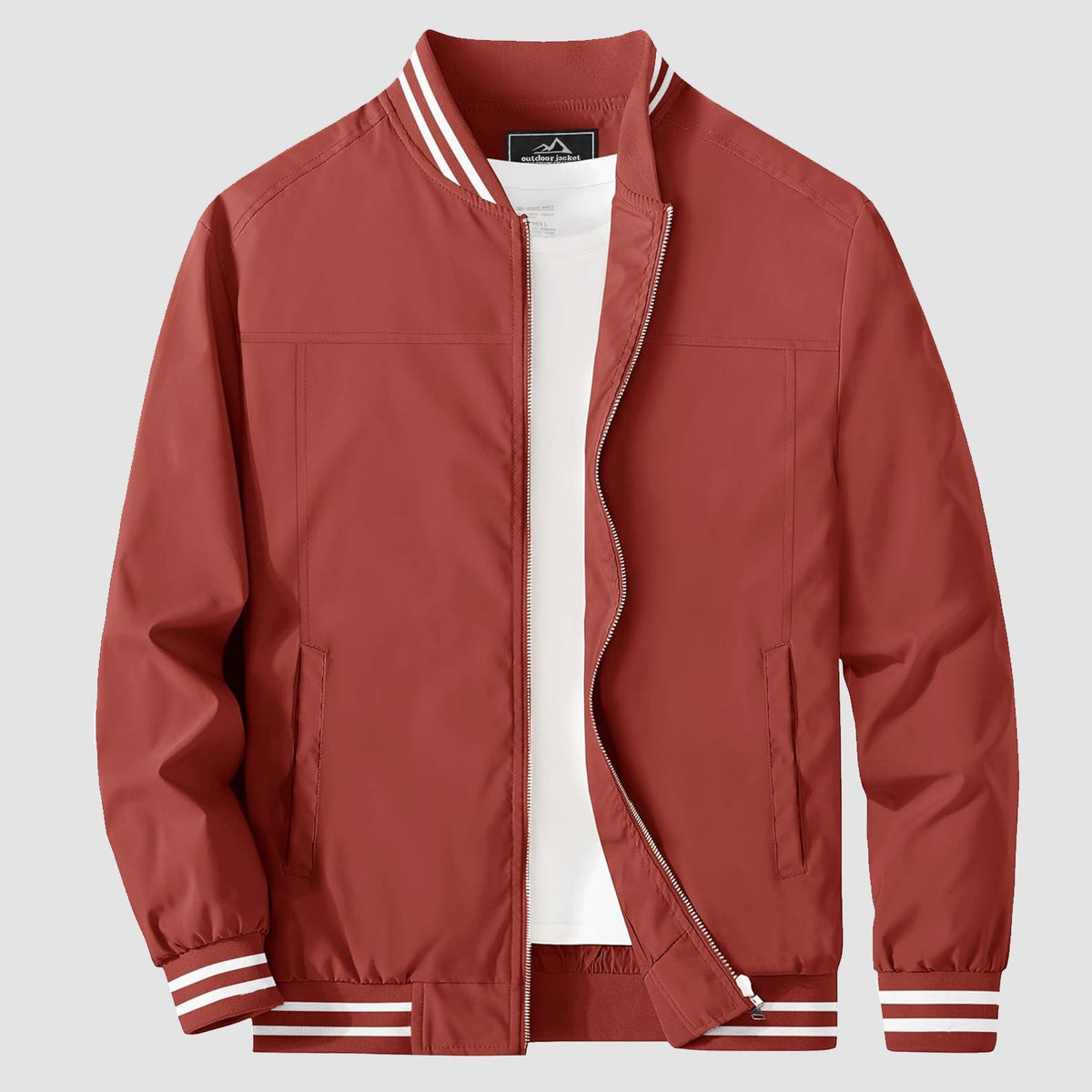 Lightweight bomber jacket windbreaker, detail of the inner phone pocket and nylon lining.