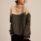 Chevron knit turtleneck sweater in brown with a relaxed fit and high collar, front view.