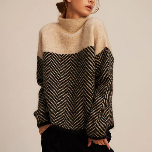 Chevron knit turtleneck sweater in brown with a relaxed fit and high collar, front view.