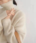 Soft knit turtleneck sweater ribbed cuff detail
