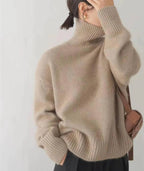 Beige soft knit turtleneck sweater with loose fit, front view
