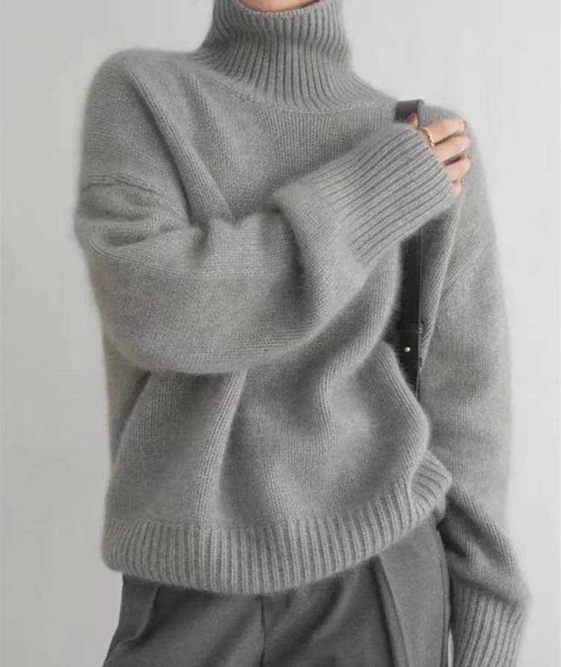 Soft knit turtleneck sweater styled with straight jeans