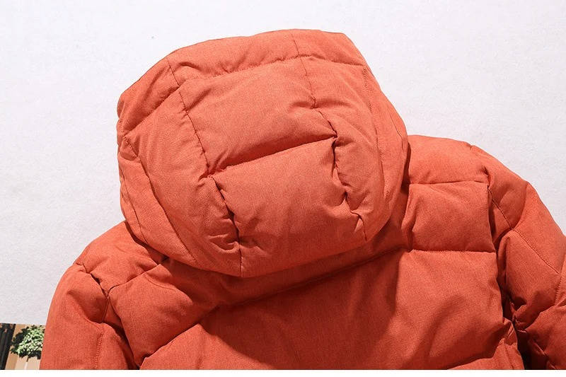 Insulated winter parka packed down small for travel and winter hiking.