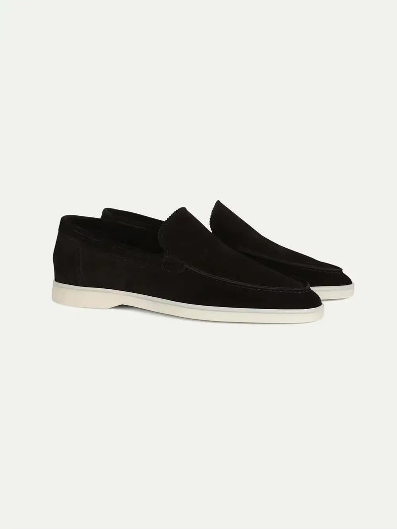 Suede yacht loafers in black, slip-on style with a non-slip yacht sole, side view.