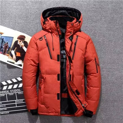 Insulated winter parka in orange, waterproof windproof hooded shell, front view.