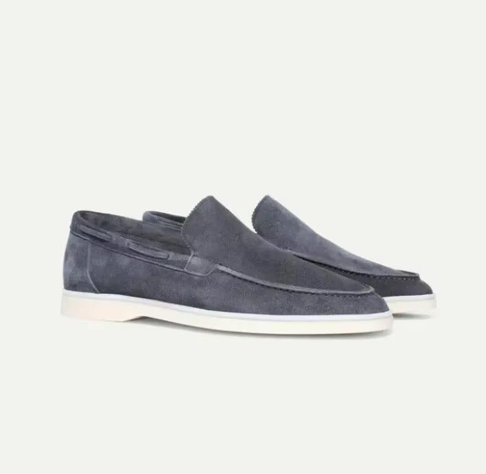 Suede yacht loafers in dark gray, slip-on style with stitched detailing, side view.