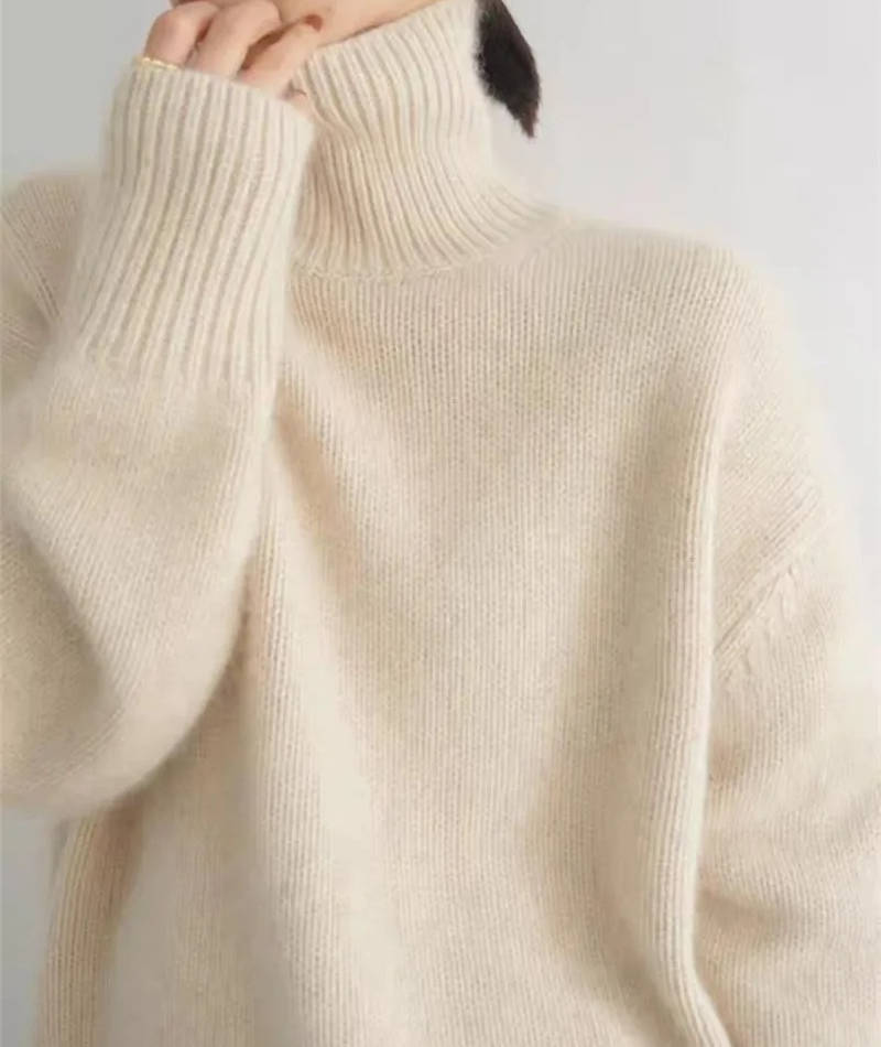 Soft knit turtleneck sweater back view showing the loose silhouette