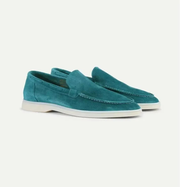 Suede yacht loafers in green, slip-on style with hand-stitched detailing, side view.