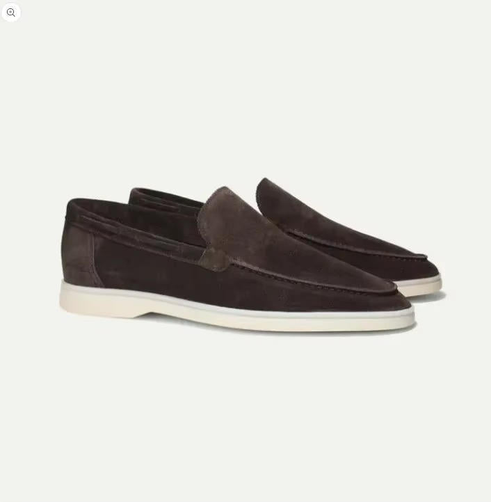 Suede yacht loafers in dark brown, slip-on style with stitched detailing, side view.