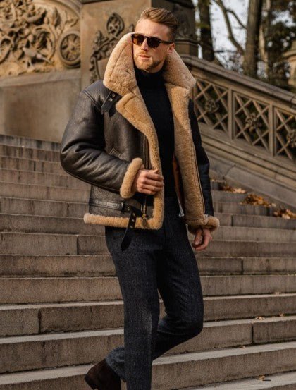 Structured leather-look jacket, detail view of the zip stand-up collar and reinforced stitching