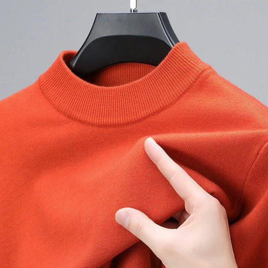 Soft knit sweater pullover in orange with a regular fit and straight hem, front view.