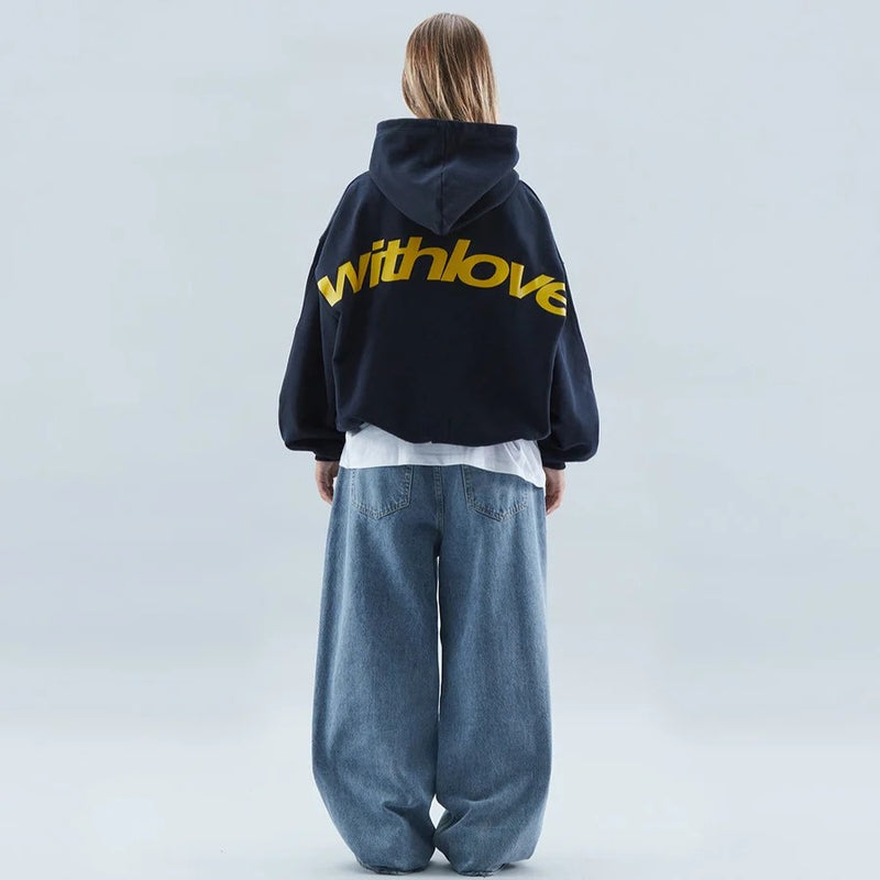 Navy oversized hoodie with adjustable drawstring hood and front pocket, front view