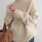 Soft knit turtleneck sweater fold-over neck detail