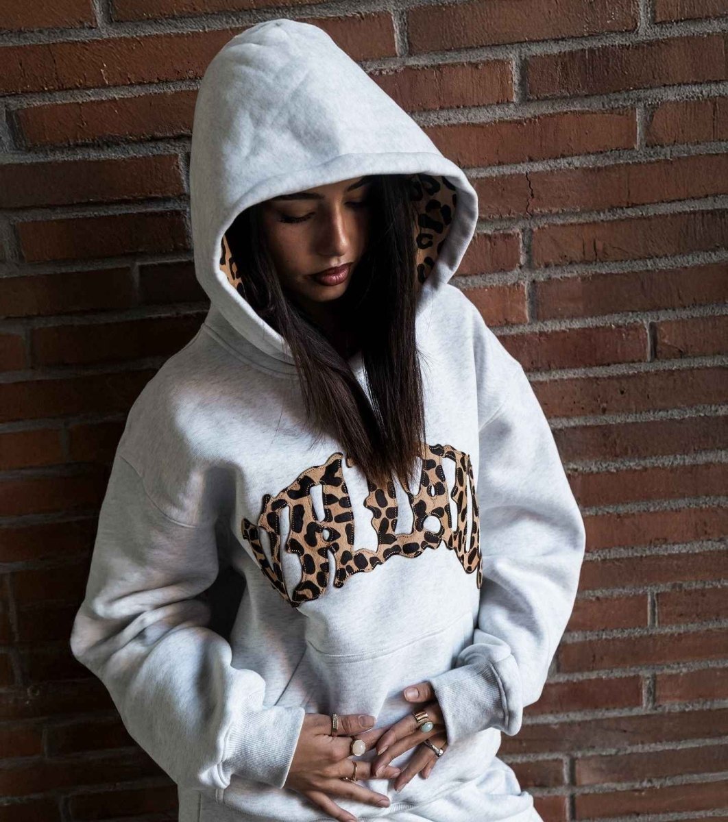 Leopard print hoodie with kangaroo pocket, front view