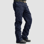 Ripstop tactical cargo pants, detail of the articulated knees built for mobility.