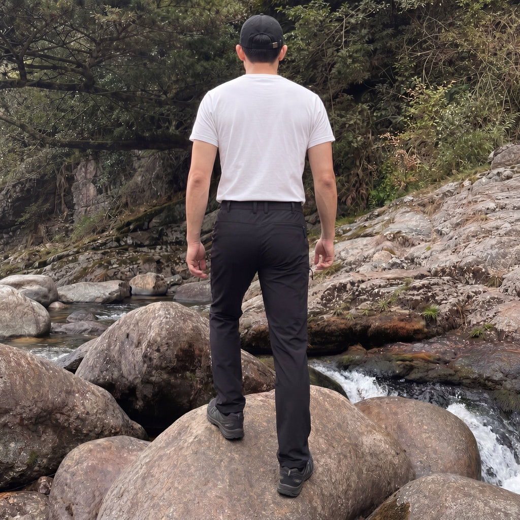 Black ripstop cargo pants with six pockets, water resistant hiking trousers