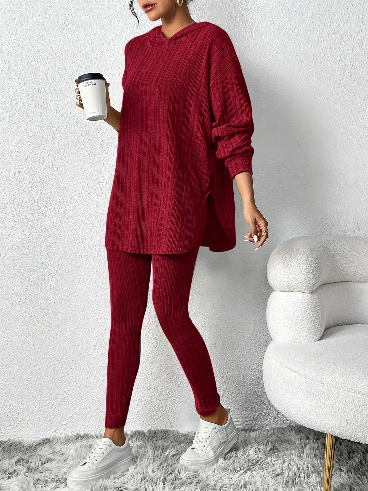 Red ribbed knit lounge set with hooded top and leggings, front view