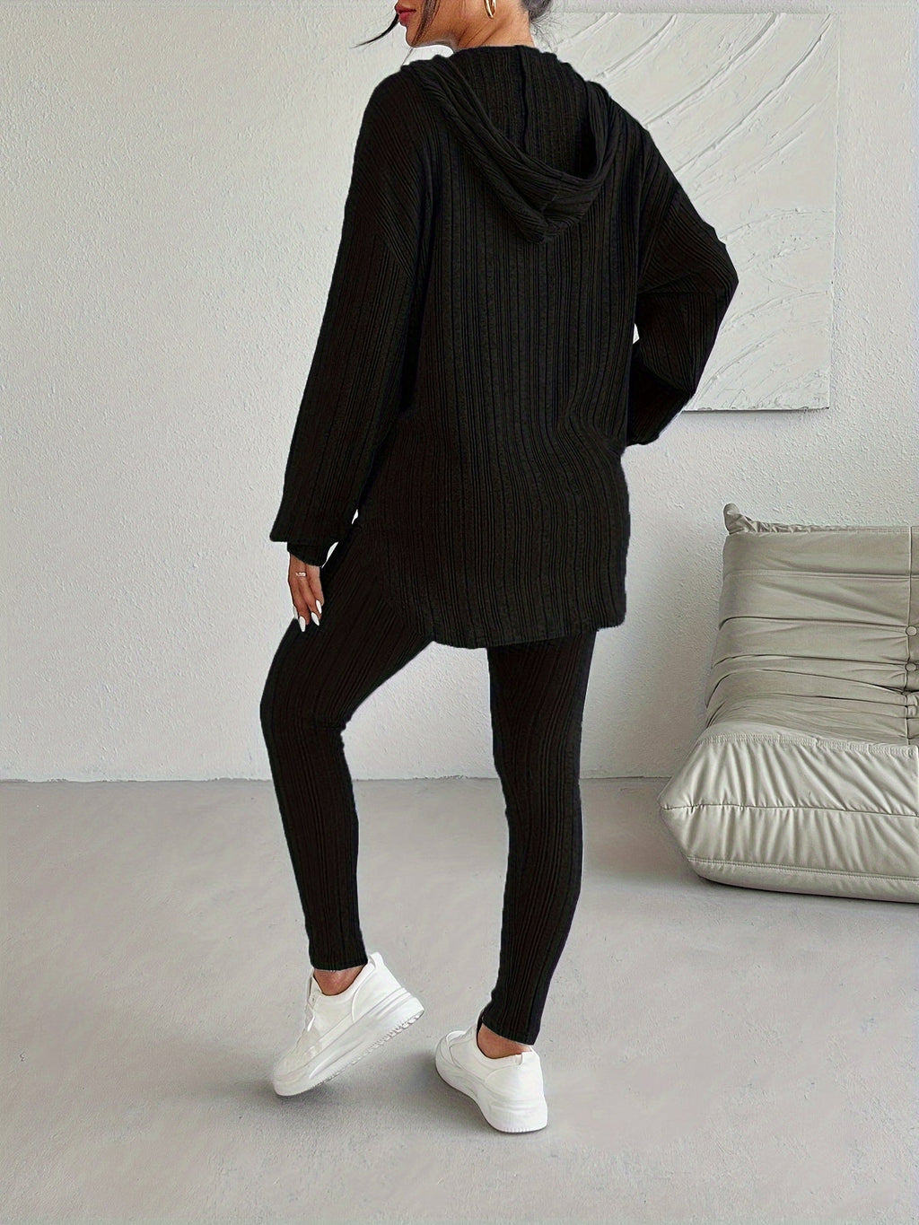 Ribbed knit two-piece lounge set with hood up, three-quarter view