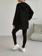 Ribbed knit two-piece lounge set with hood up, three-quarter view
