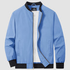 Bomber jacket windbreaker detail: zip front, side hand pockets and ribbed hem.