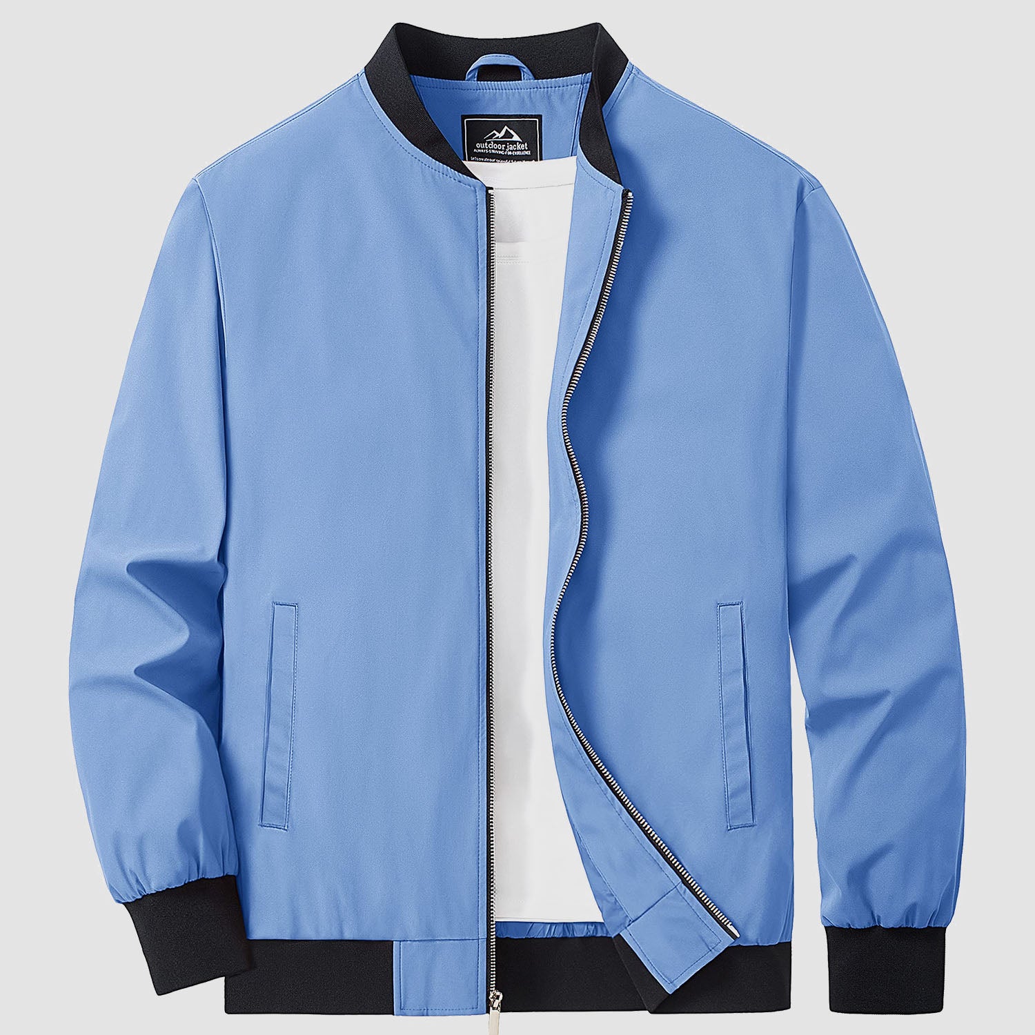 Bomber jacket windbreaker detail: zip front, side hand pockets and ribbed hem.