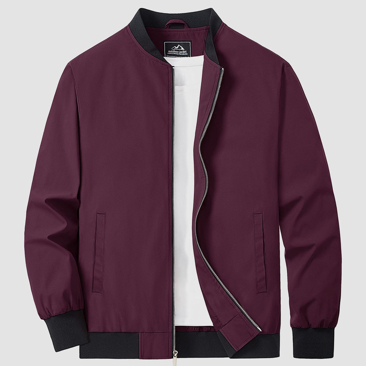 Bomber jacket windbreaker in Blue Green, ribbed collar and cuffs with full zip front.