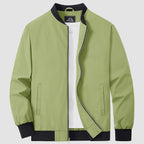 Bomber jacket windbreaker detail: zip front, side hand pockets and ribbed hem.