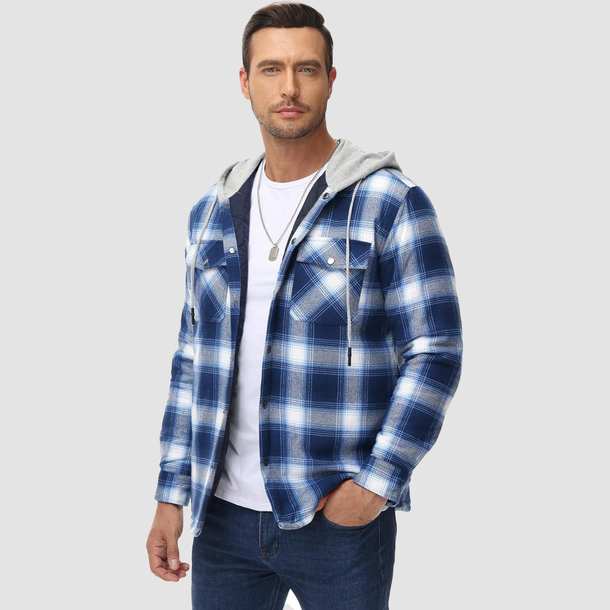 Quilted flannel jacket in Black plaid with an adjustable hood and button-down front.