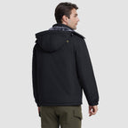 Water-resistant ski jacket worn outdoors
