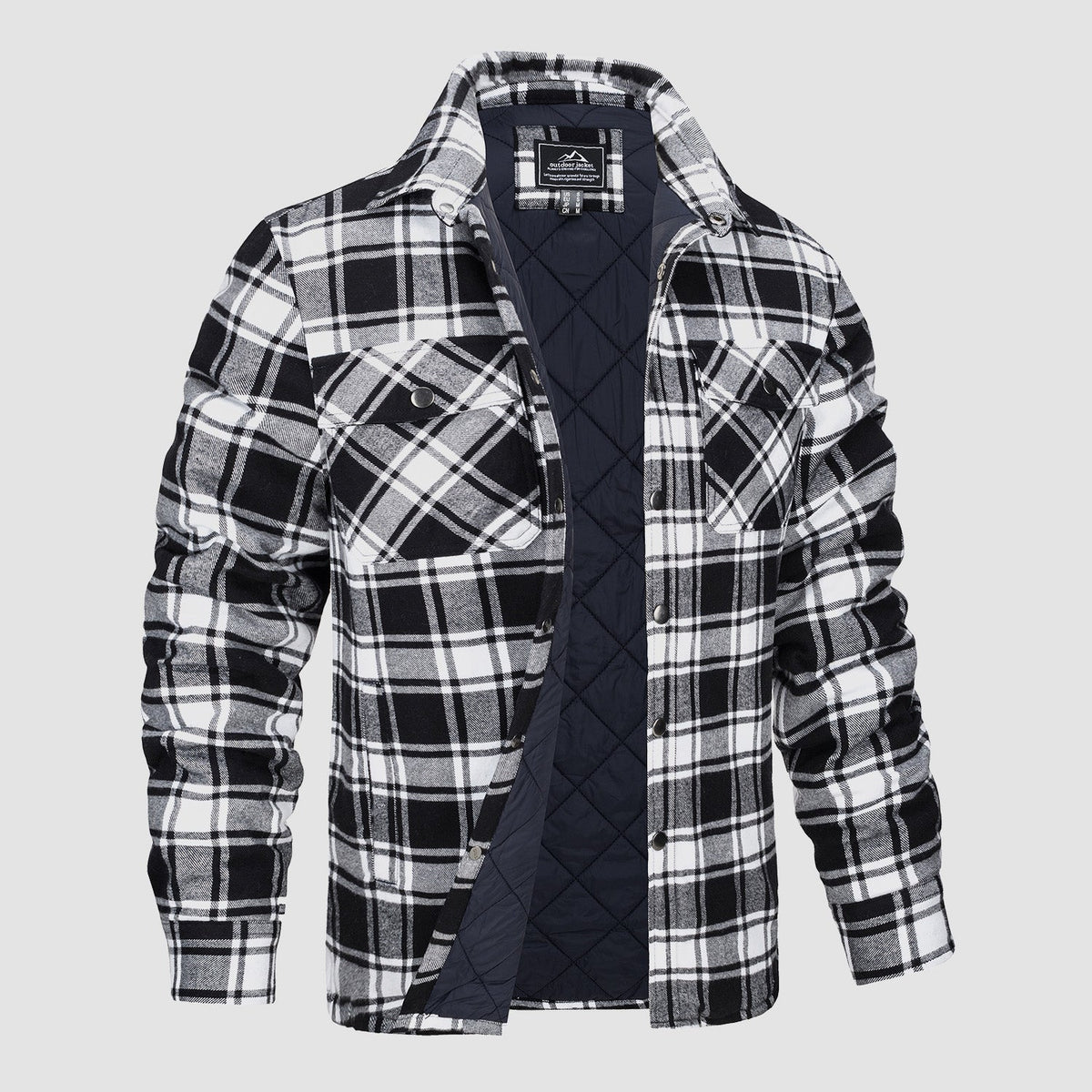 Quilted flannel jacket detail showing the chest and side pockets