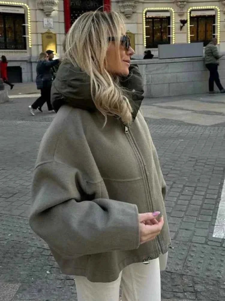 Olive quilted jacket with oversized fit and hood, front view