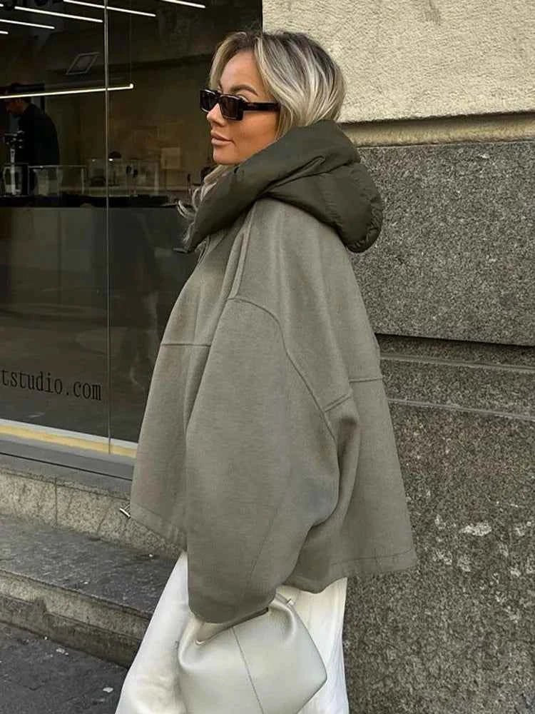Olive quilted jacket with concealed zip closure, styled view