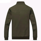 Bomber jacket with mandarin collar, close-up detail of the shoulder epaulets and ribbed cuffs