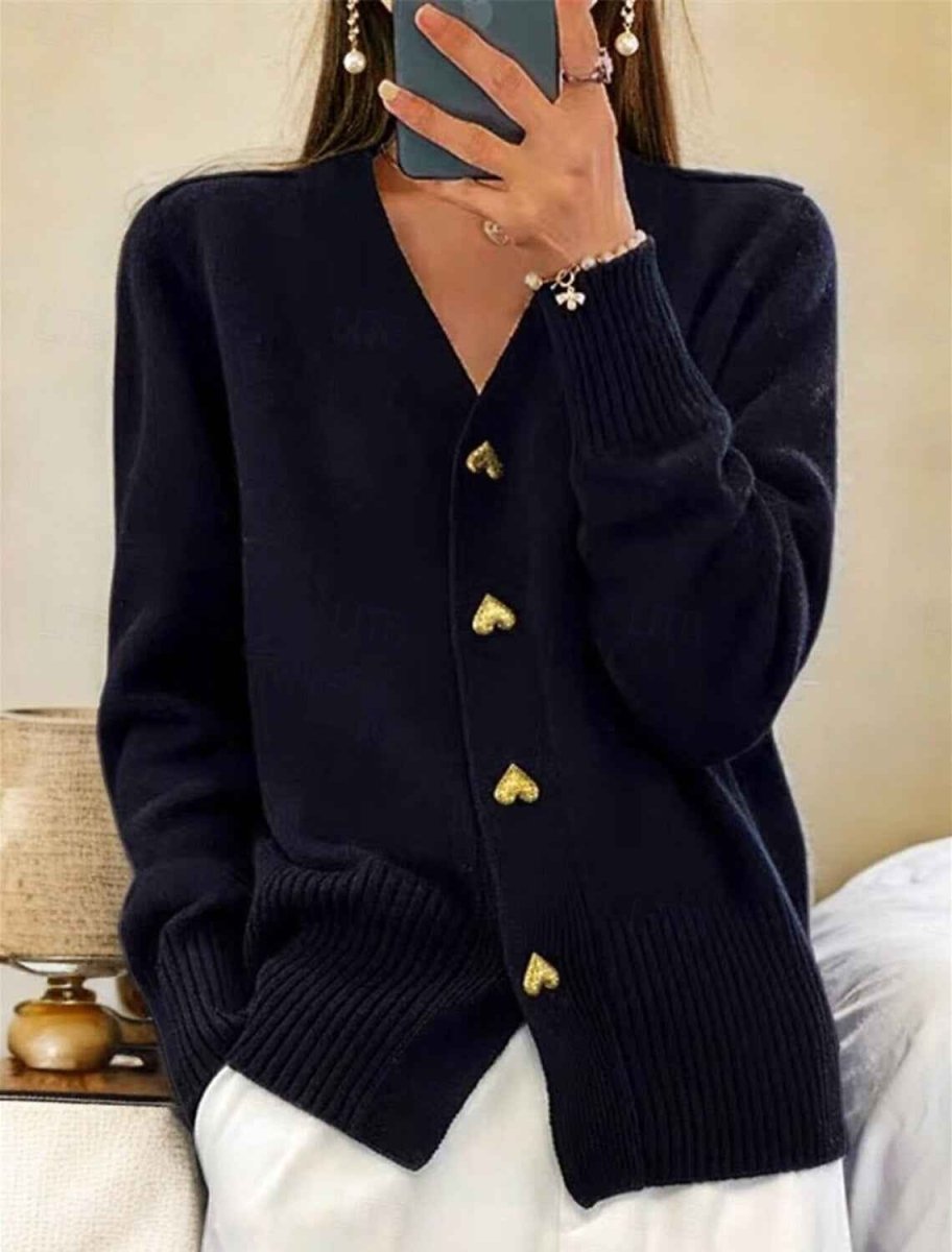 Black minimalist cardigan with buttoned front and straight cut