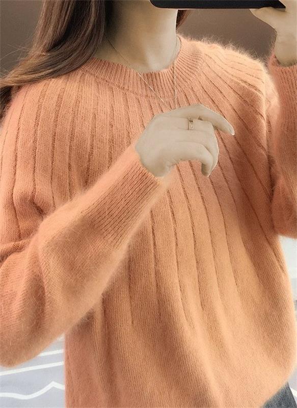 Orange soft knit sweater for warm winter layering, front view