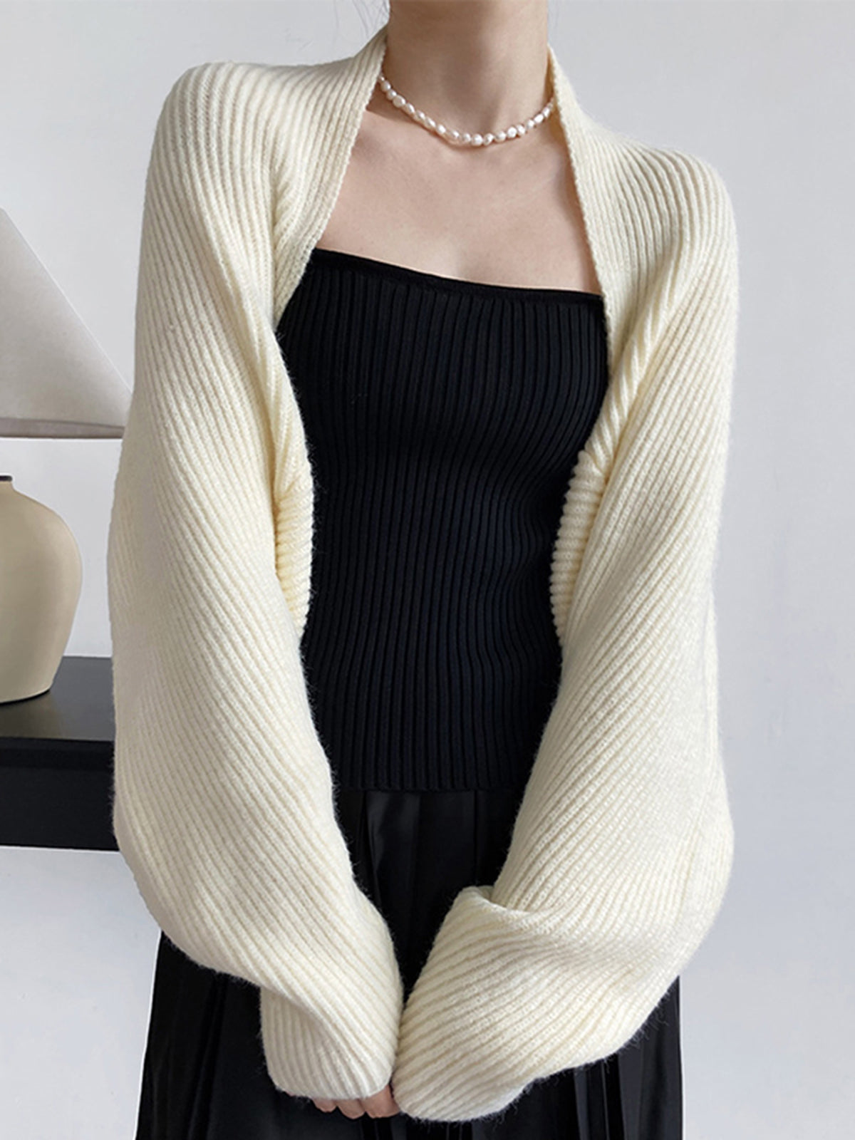 Open front shrug sweater with relaxed shift fit, side view