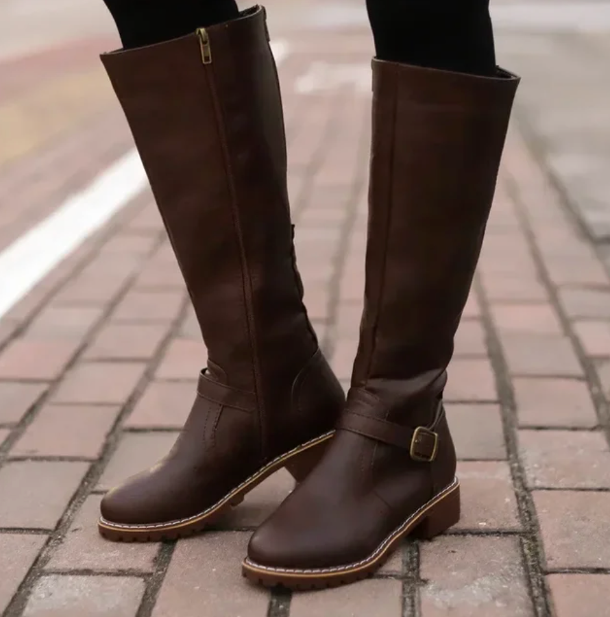Brown comfort boots with removable footbed, non-slip sole, angled view