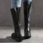 Brown comfort boots with removable footbed, non-slip sole, detail view