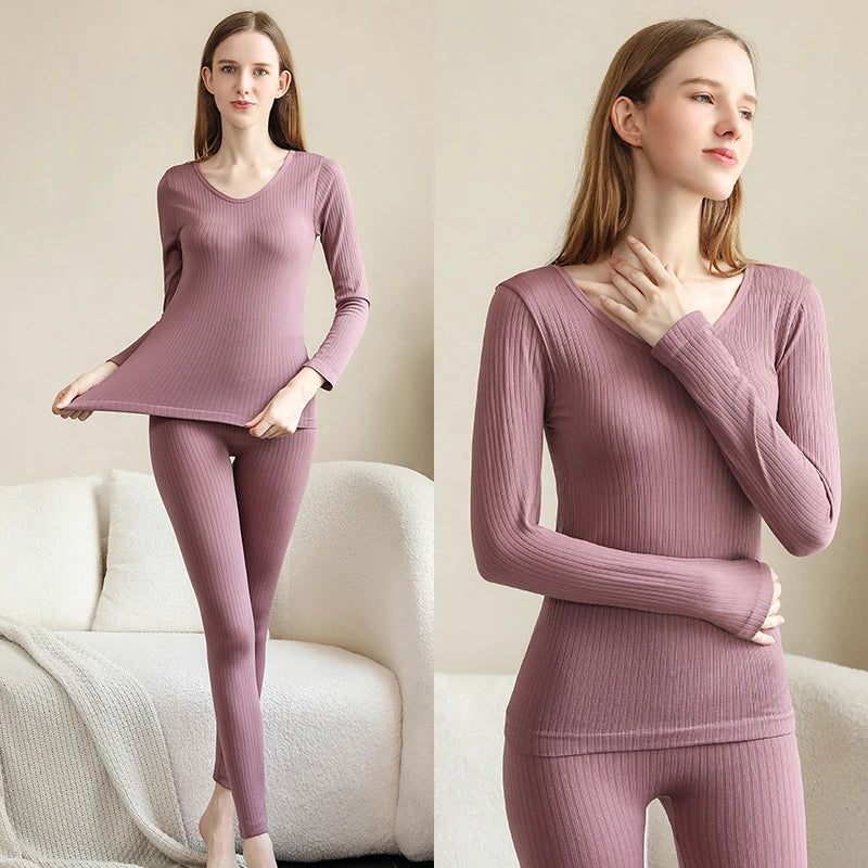Thermal underwear set in purple, shaping two-piece top and trousers.