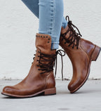 Orthopedic lace-up ankle boots in brown.