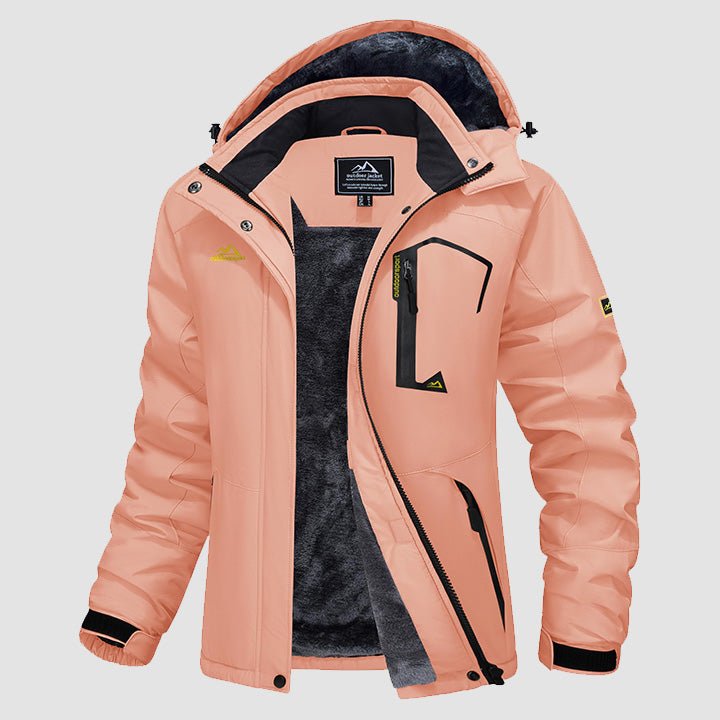 Hooded water-resistant ski jacket, detail of the fleece lining and zip pockets.