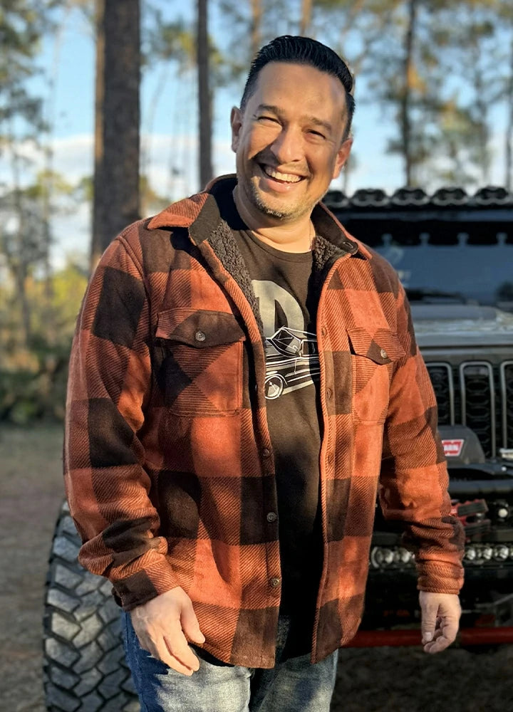 Plaid shirt jacket in Buffalo Brown, sherpa-lined with four pockets and button front.